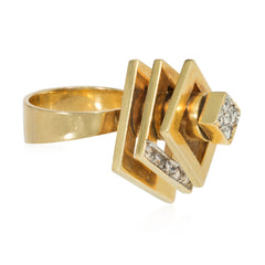 A gold and diamond kinetic "spinner" ring comprised of verti...