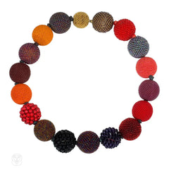 A multi-colored beaded ball necklace comprising 18 spheres w...