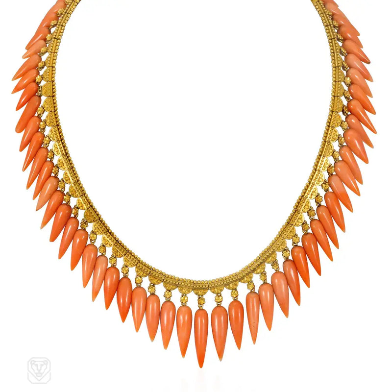 An Etruscan Revival fringe necklace comprised of granulated...