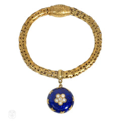 Antique gold bracelet with a blue enamel flower locket