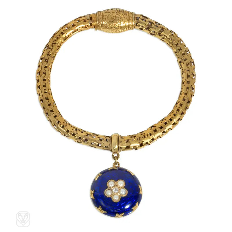 Antique Gold Bracelet With A Blue Enamel Flower Locket