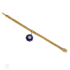 Antique gold bracelet with a blue enamel flower locket