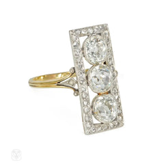 Antique three-stone diamond, platinum, and gold plaque ring