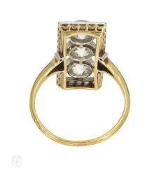 Antique three-stone diamond, platinum, and gold plaque ring