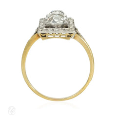 Antique three-stone diamond, platinum, and gold plaque ring