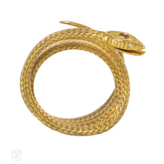 Antique woven gold coiled snake bracelet with gemset head