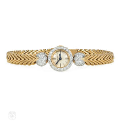 Cartier diamond and gold backwound wristwatch