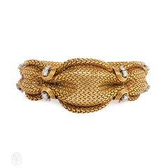 Mid-Century woven gold and diamond bracelet, France.