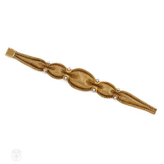 Mid-Century woven gold and diamond bracelet, France.