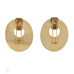 Pair of Retro gold radiating clip brooches