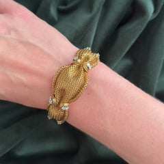 Mid-Century woven gold and diamond bracelet, France.