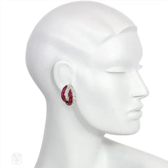 Retro invisibly set ruby and diamond stylized knot earrings